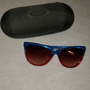 Red and Blue Oakley sunglasses